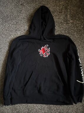 Champion Black Hoodie with Red Graphic and Script Sleeve